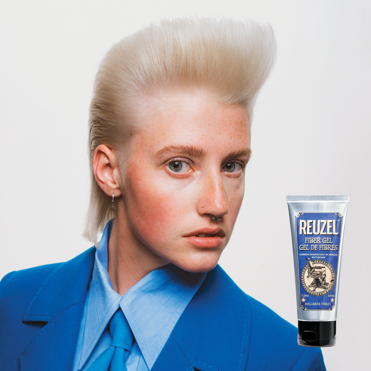 Reuzel Deutschland Fiber Gel hair styling product in a jar, showcasing its thick, textured gel for strong hold and styling.