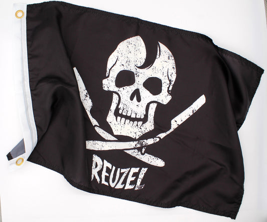 Black pirate flag with a white skull and open razors design and 'REUZEL' branding on a white background.