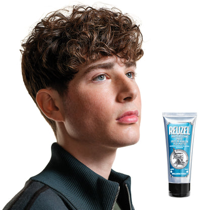 Man with styled hair next to a Reuzel Matte Styling Paste on a white background
