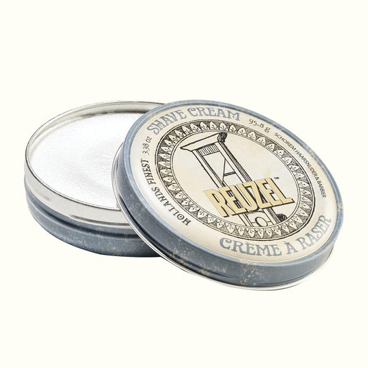 Reuzel shave cream tin with lid on a white background