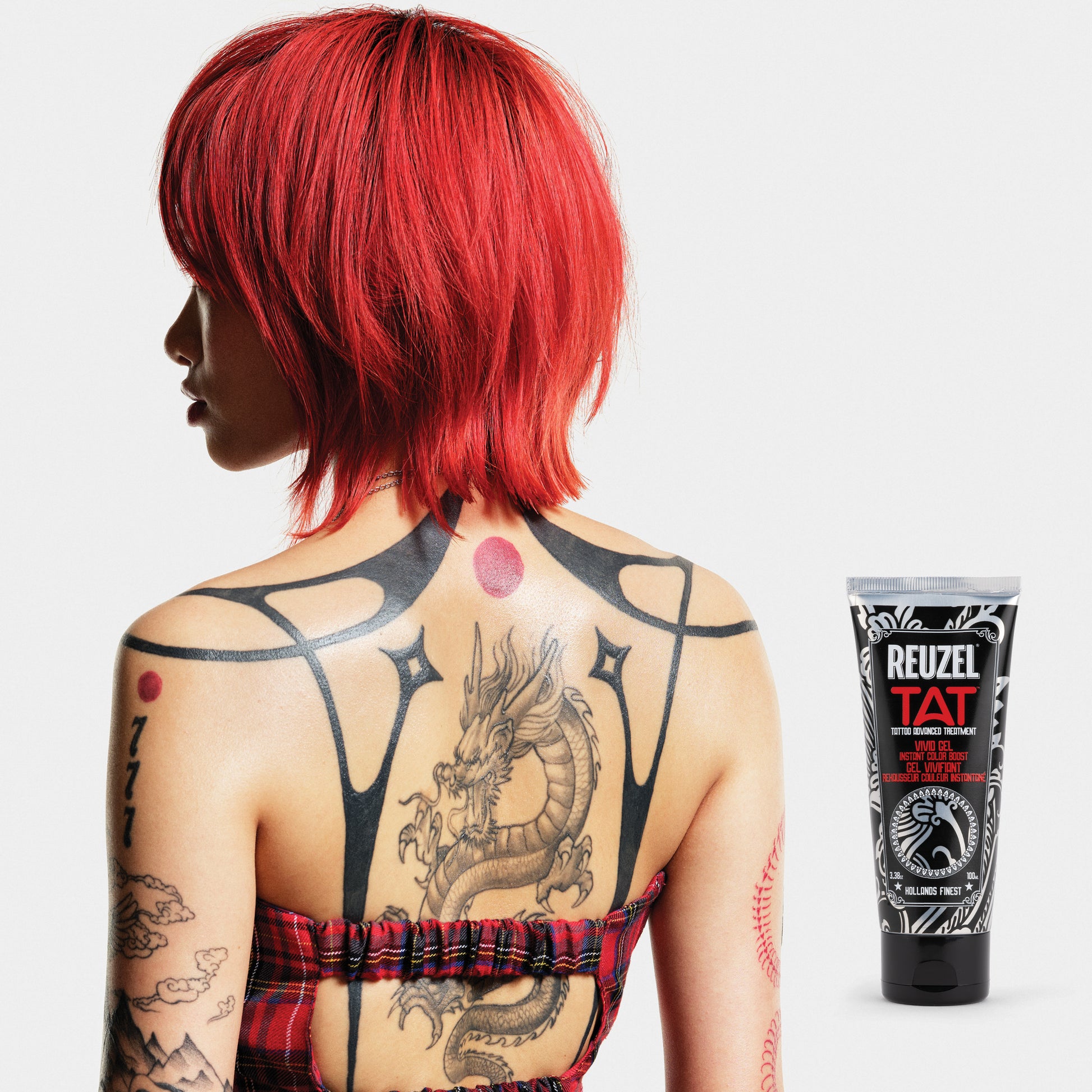 Reuzel Deutschland VIVID Gel tattoo aftercare product in a clear container with bright packaging, designed for healing tattoos.